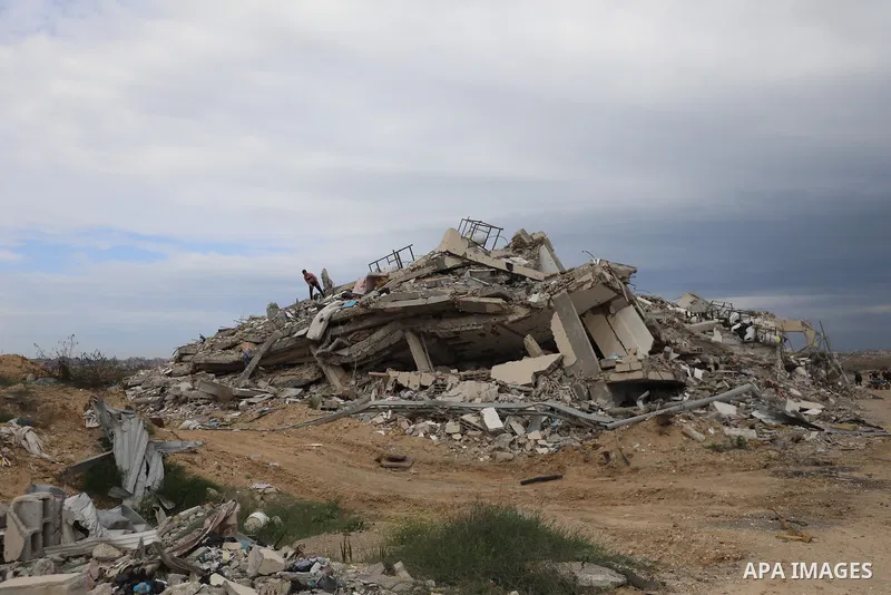 Palestinians inspect the damage to the TIKA towers after the Israeli occupation army withdrew from the Juhr al-Dik area, as part of a ceasefire agreement with Hamas in Gaza City, Gaza on February 9, 2025. The Israeli occ...