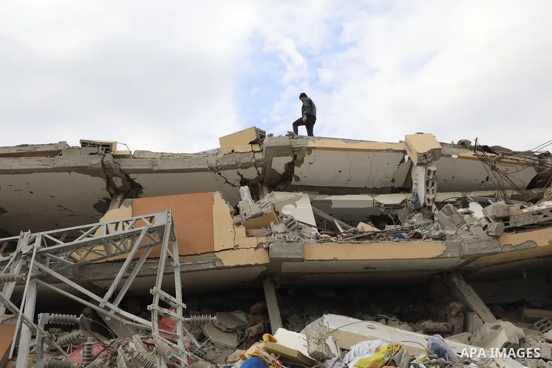 Palestinians inspect the damage to the TIKA towers after the Israeli occupation army withdrew from the Juhr al-Dik area, as part of a ceasefire agreement with Hamas in Gaza City, Gaza on February 9, 2025. The Israeli occ...