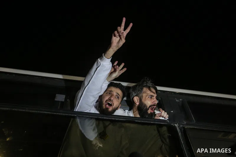 Freed Palestinian prisoners are greeted as they arrive in the Gaza Strip after being released from an Israeli prison following a ceasefire agreement between Hamas and Israel in Khan Younis, Gaza Strip, Thursday, Feb. 27,...