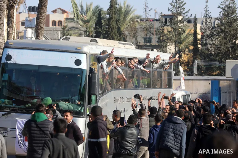 A bus carrying former Palestinian prisoners arrives at the European Hospital in Khan Yunis in the southern Gaza Strip on February 27, 2025, following their release by Israeli authorities. Hamas handed over the coffins of...