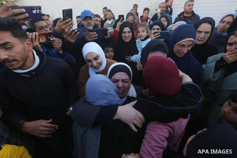 Palestinians prisoners are embraced by members of thier family at the European Hospital in Khan Yunis in the southern Gaza Strip on February 27, 2025, following his release by Israeli authorities. Hamas handed over the c...