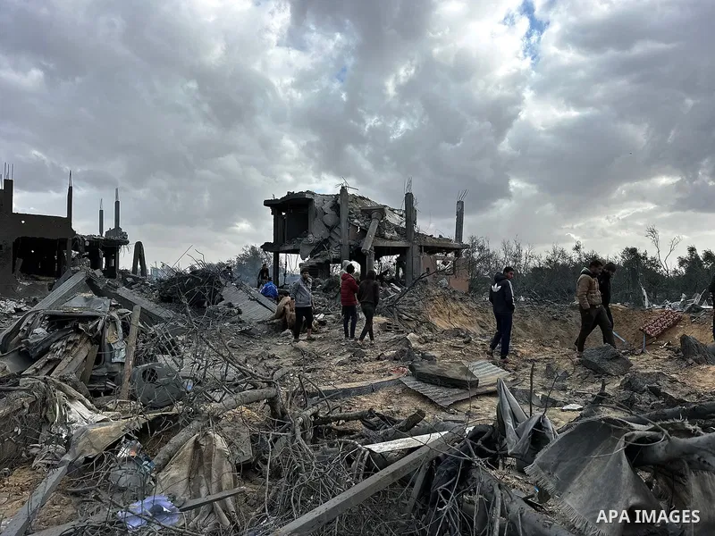 A view of destroyed residential buildings and wrecked vehicles at Abasan al-Kabira, a village just outside of Khan Yunis after Israeli warplanes attacked over in Khan Yunis, Gaza on March 20, 2025. Many people were kille...