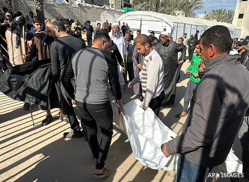 A funeral ceremony is held in front of Nasser Hospital for the people who lost their lives, including women and children, in the Israeli army attack on the building belonging to the Al-Farra family home in Khan Yunis, Ga...