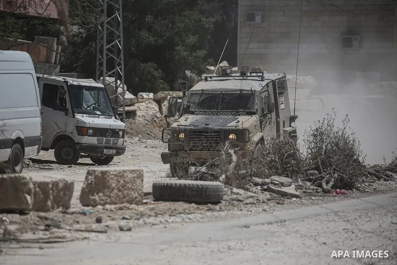 Palestinians leave home with their belongings after Israeli forces issued demolition orders in Tulkarm refugee camp, the northern West Bank, on May 7, 2025. Tensions in the West Bank have been escalating since the onset...