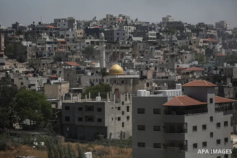 Palestinians leave home with their belongings after Israeli forces issued demolition orders in Tulkarm refugee camp, the northern West Bank, on May 7, 2025. Tensions in the West Bank have been escalating since the onset...