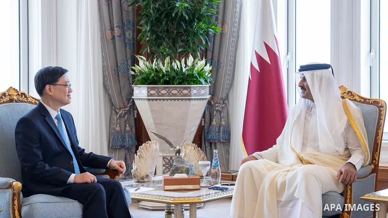 Qatari Emir, Tamim bin Hamad, Al Thani receives Chief Executive of the Hong Kong Special Administrative Region of the People's Republic of China, John Lee, in Doha, Qatar on May 11, 2025. Photo by Emiri Diwan Office\ apa...