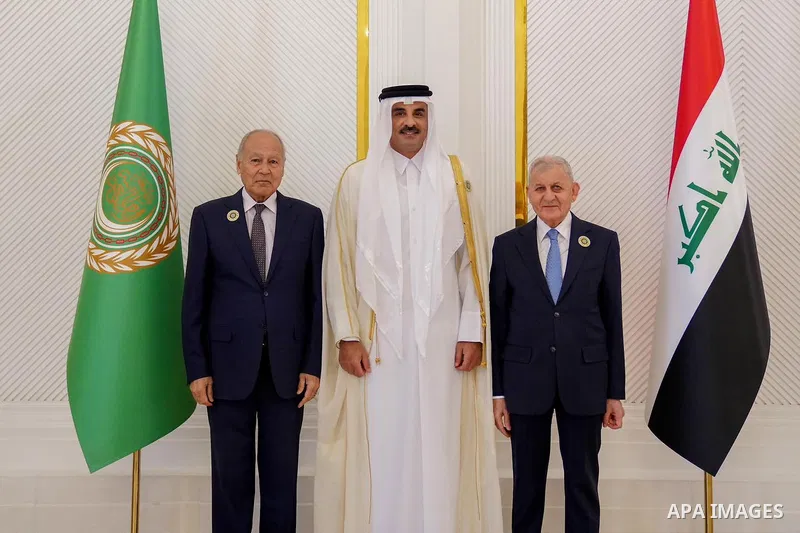 Iraqi President, Abdul Latif Jamal Rashid, meets with the head of the Qatari delegation, His Highness the Emir, Tamim bin Hamad Al Thani, in Baghdad, May 17, 2025, ahead of the 34th Arab Summit. Photo by Iraqi Presidency...