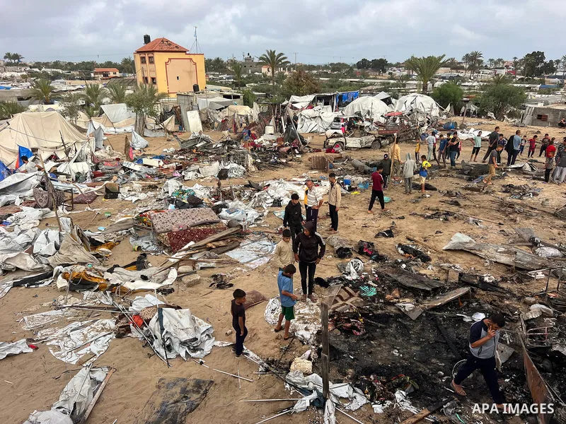 Palestinians inspect the damage, following overnight Israeli strikes on makeshift homes and tents, in Khan Yunis, south of Gaza Strip, on May 18, 2025. Photo by Doaa el-Baz\ apaimages