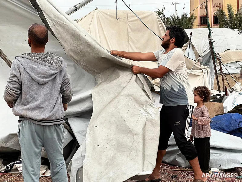 Palestinians inspect the damage, following overnight Israeli strikes on makeshift homes and tents, in Khan Yunis, south of Gaza Strip, on May 18, 2025. Photo by Doaa el-Baz\ apaimages