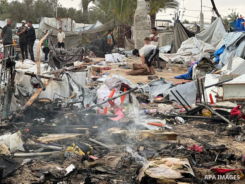 Palestinians inspect the damage, following overnight Israeli strikes on makeshift homes and tents, in Khan Yunis, south of Gaza Strip, on May 18, 2025. Photo by Doaa el-Baz\ apaimages