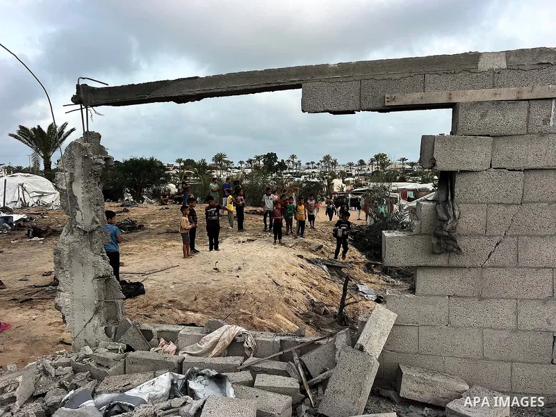 Palestinians inspect the damage, following overnight Israeli strikes on makeshift homes and tents, in Khan Yunis, south of Gaza Strip, on May 18, 2025. Photo by Doaa el-Baz\ apaimages