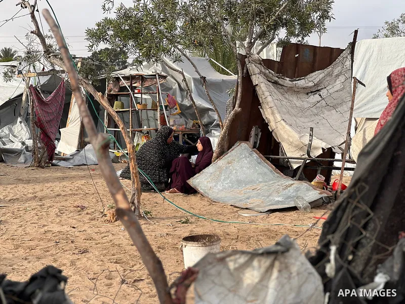 Palestinians inspect the damage, following overnight Israeli strikes on makeshift homes and tents, in Khan Yunis, south of Gaza Strip, on May 18, 2025. Photo by Doaa el-Baz\ apaimages