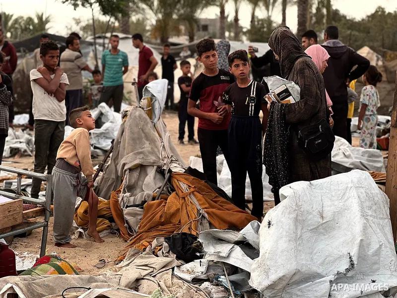 Palestinians inspect the damage, following overnight Israeli strikes on makeshift homes and tents, in Khan Yunis, south of Gaza Strip, on May 18, 2025. Photo by Doaa el-Baz\ apaimages
