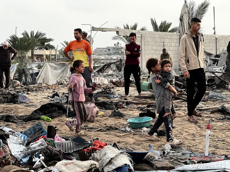 Palestinians inspect the damage, following overnight Israeli strikes on makeshift homes and tents, in Khan Yunis, south of Gaza Strip, on May 18, 2025. Photo by Doaa el-Baz\ apaimages