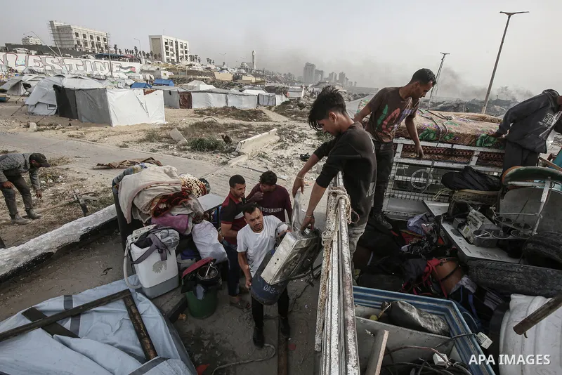 Displaced Palestinians set up makeshift tents at the Gaza Port for shelter following Israel attacks on northern of Gaza Strip, on May 18, 2025. Civilians forced to flee from the northern and eastern regions now live in m...