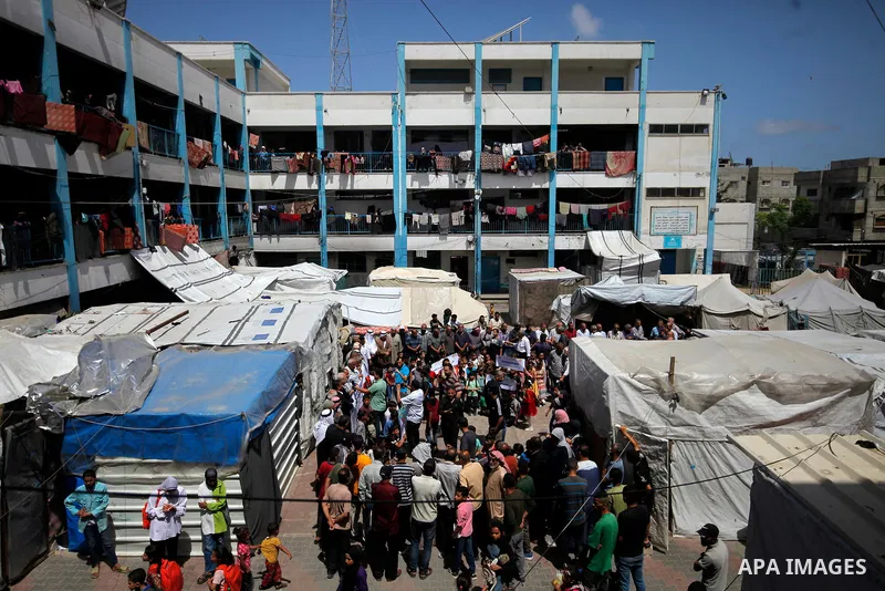 Palestinians participate in a solidarity stand in support of UNRWA, in light of the ongoing campaign against it at the Abu Helou East School in Al-Bureij camp, central Gaza Strip. Photo by Moiz Salhi \ apaimages