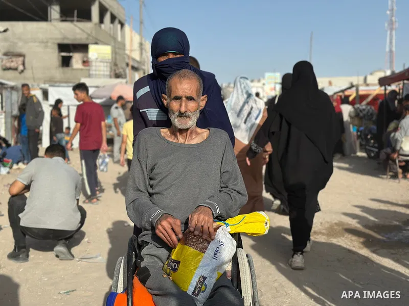 Palestinians move to the coastal area of al-Mawasi with their belongings, after the Israeli army ordered the evacuation of a large area announcing that they would launch an attack on Khan Yunis, on May 19, 2025. Photo by...