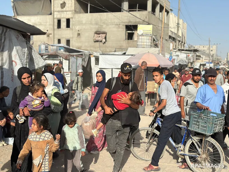 Palestinians move to the coastal area of al-Mawasi with their belongings, after the Israeli army ordered the evacuation of a large area announcing that they would launch an attack on Khan Yunis, on May 19, 2025. Photo by...