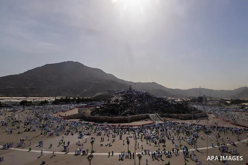 Muslim pilgrims gather at Jabal al-Rahmah, also known as Mount Arafat, during the annual hajj pilgrimage, outside the holy city of Mecca, Saudi Arabia, June 5, 2025. Photo by Saudi Press Agency\ APA Images