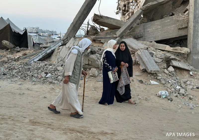 Internally displaced Palestinians attend performing Eid al-Adha prayers on the ruins of a destroyed mosque, in Khan Yunis in the southern Gaza Strip, 06 June 2025. Eid al-Adha is the holiest of the two major Muslim holid...