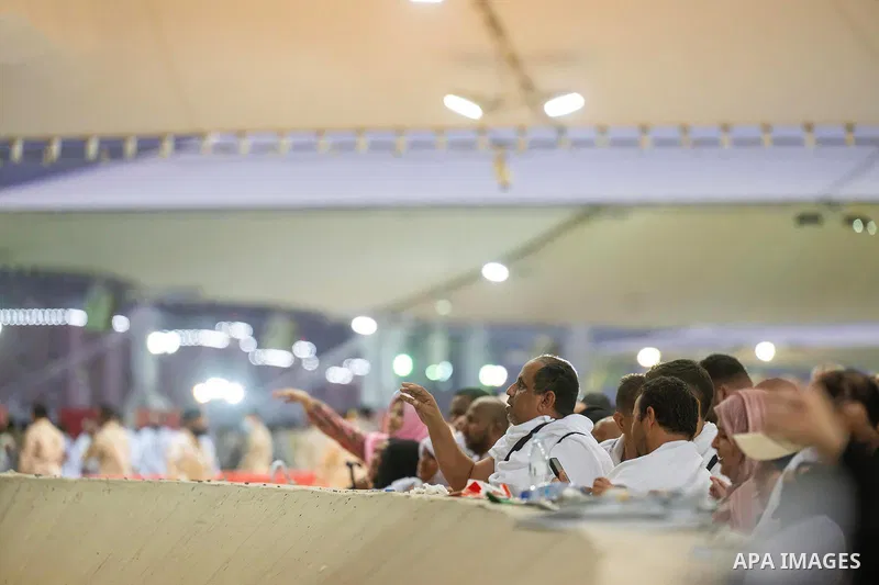 Muslim pilgrims cast stones at pillars in the symbolic stoning of the devil, the last rite of the annual Hajj, in Mina near the holy city of Mecca, Saudi Arabia, Saturday, June 7, 2025. Photo by Saudi Press Agency