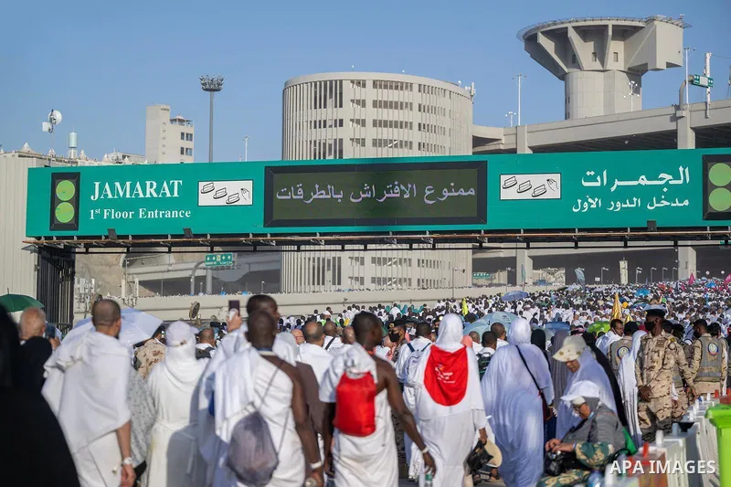 Muslim pilgrims cast stones at pillars in the symbolic stoning of the devil, the last rite of the annual Hajj, in Mina near the holy city of Mecca, Saudi Arabia, Saturday, June 7, 2025. Photo by Saudi Press Agency