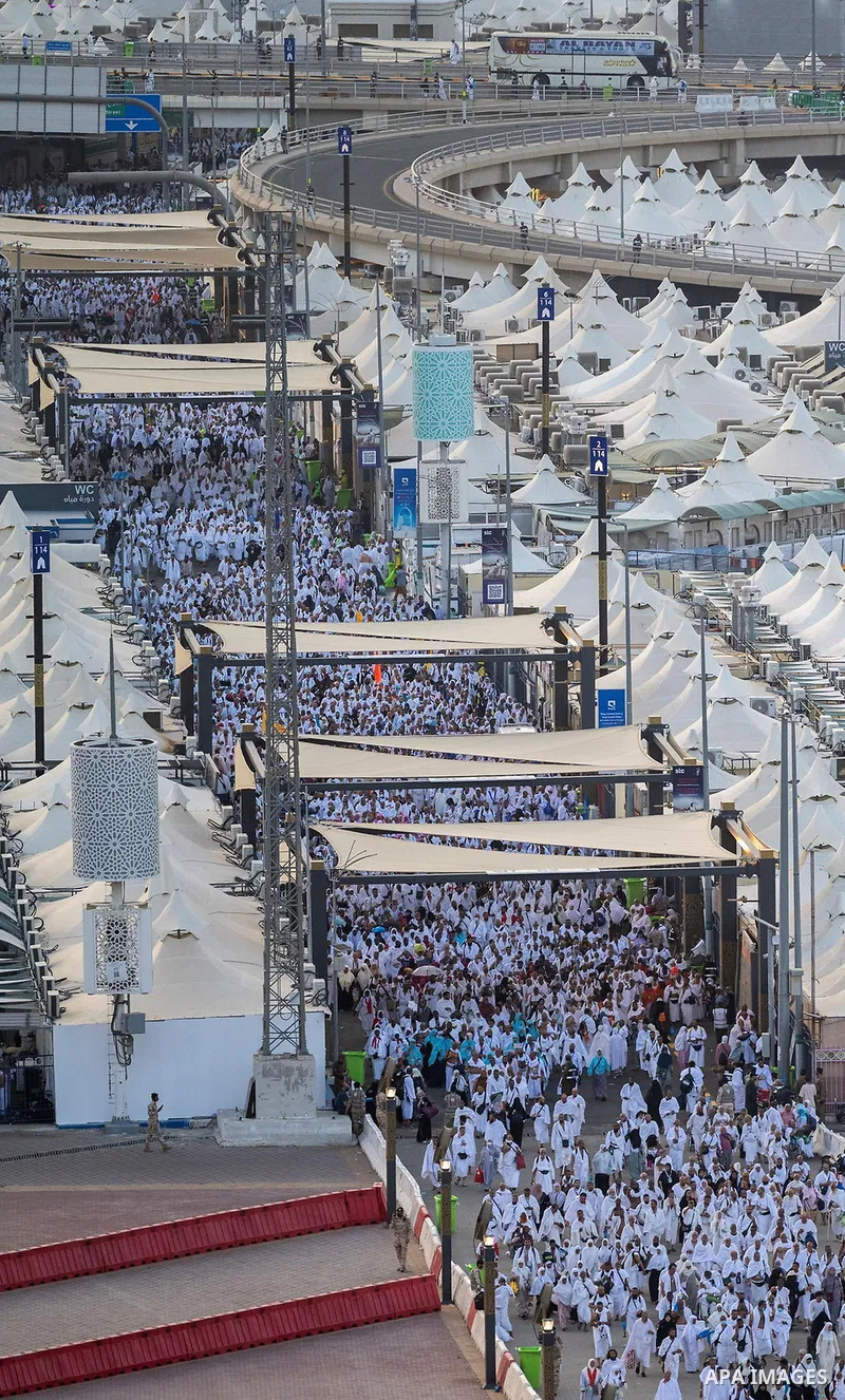 Muslim pilgrims cast stones at pillars in the symbolic stoning of the devil, the last rite of the annual Hajj, in Mina near the holy city of Mecca, Saudi Arabia, Saturday, June 7, 2025. Photo by Saudi Press Agency