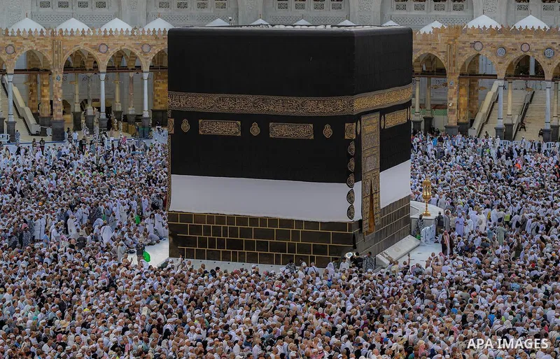 Muslim pilgrims perform prayer around the Kaaba, Islam's holiest shrine, at the Grand Mosque complex in Mecca on June 7, 2025, in the second days the Eid al-Adha festival, which marks the end of their Hajj pilgrimage. Ph...