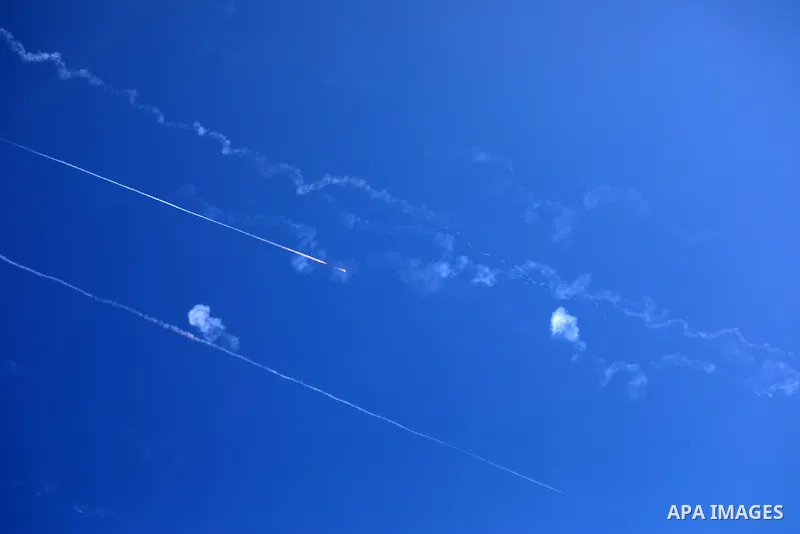 Missiles fired from Iran in retaliation for Israeli attacks are seen in the sky over the Hebron, West Bank on June 20, 2025. Photo by Mamoun Wazwaz\ apaimages