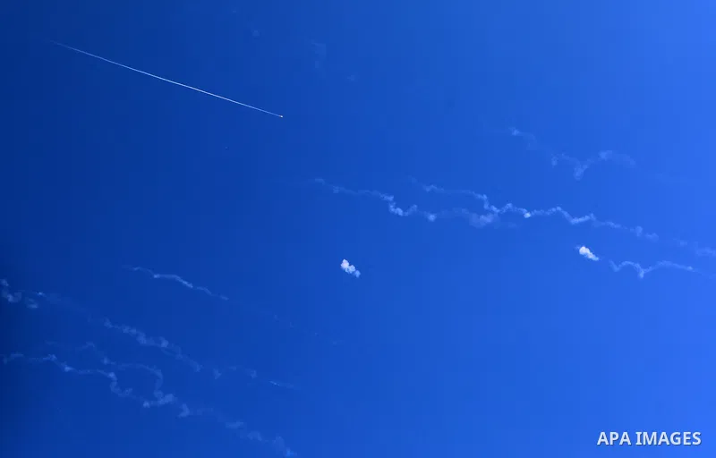 Missiles fired from Iran in retaliation for Israeli attacks are seen in the sky over the Hebron, West Bank on June 20, 2025. Photo by Mamoun Wazwaz\ apaimages
