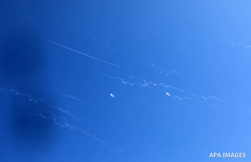 Missiles fired from Iran in retaliation for Israeli attacks are seen in the sky over the Hebron, West Bank on June 20, 2025. Photo by Mamoun Wazwaz\ apaimages