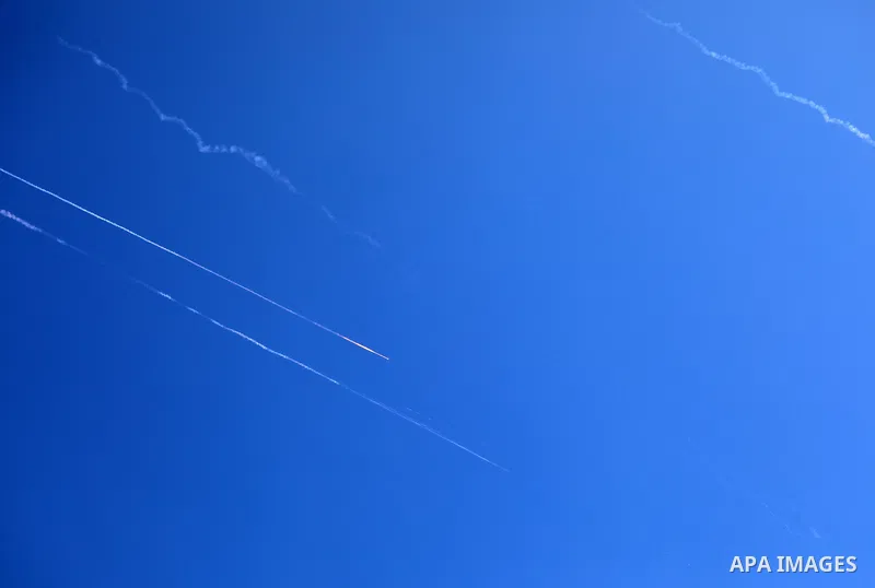 Missiles fired from Iran in retaliation for Israeli attacks are seen in the sky over the Hebron, West Bank on June 20, 2025. Photo by Mamoun Wazwaz\ apaimages