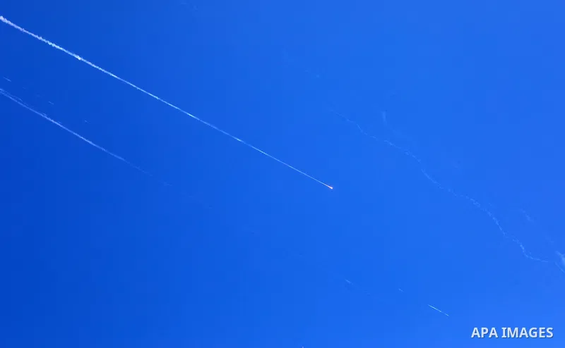 Missiles fired from Iran in retaliation for Israeli attacks are seen in the sky over the Hebron, West Bank on June 20, 2025. Photo by Mamoun Wazwaz\ apaimages