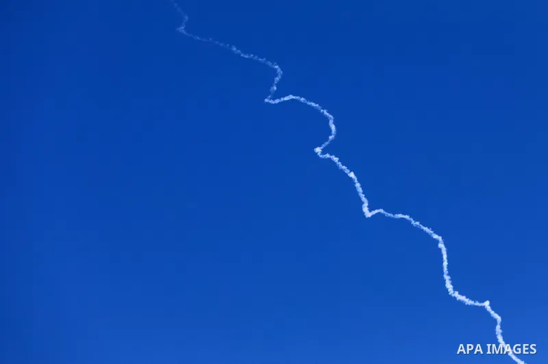 Missiles fired from Iran in retaliation for Israeli attacks are seen in the sky over the Hebron, West Bank on June 20, 2025. Photo by Mamoun Wazwaz\ apaimages