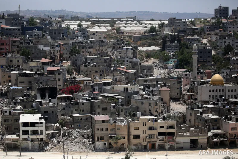 Israeli army heavy machinery demolishes a home at the Nur Shams Palestinian refugee camp, east of Tulkarem, in the Israeli occupied West Bank on June 25, 2025, during an ongoing military operation in the north of the Pal...