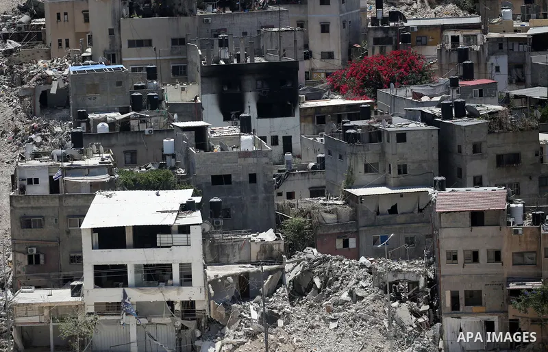 Israeli army heavy machinery demolishes a home at the Nur Shams Palestinian refugee camp, east of Tulkarem, in the Israeli occupied West Bank on June 25, 2025, during an ongoing military operation in the north of the Pal...