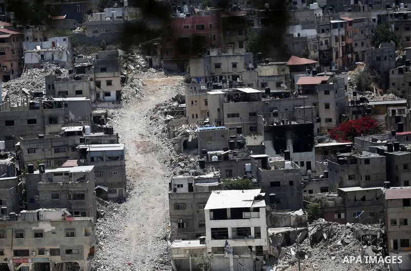 Israeli army heavy machinery demolishes a home at the Nur Shams Palestinian refugee camp, east of Tulkarem, in the Israeli occupied West Bank on June 25, 2025, during an ongoing military operation in the north of the Pal...