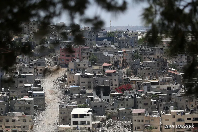 Israeli army heavy machinery demolishes a home at the Nur Shams Palestinian refugee camp, east of Tulkarem, in the Israeli occupied West Bank on June 25, 2025, during an ongoing military operation in the north of the Pal...