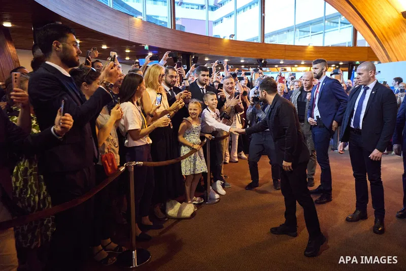 Ukrainian President Volodymyr Zelenskyy, with Council of Europe Secretary General Allen Peers, signs an agreement to establish a special tribunal for the crime of aggression against Ukraine, in The Hague, Netherlands, on...