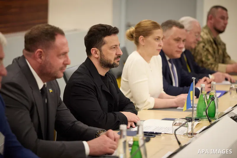 Ukrainian President Volodymyr Zelenskyy, with Council of Europe Secretary General Allen Peers, signs an agreement to establish a special tribunal for the crime of aggression against Ukraine, in The Hague, Netherlands, on...