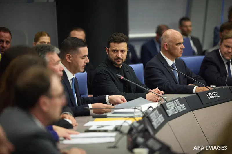 Ukrainian President Volodymyr Zelenskyy, with Council of Europe Secretary General Allen Peers, signs an agreement to establish a special tribunal for the crime of aggression against Ukraine, in The Hague, Netherlands, on...