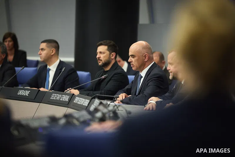 Ukrainian President Volodymyr Zelenskyy, with Council of Europe Secretary General Allen Peers, signs an agreement to establish a special tribunal for the crime of aggression against Ukraine, in The Hague, Netherlands, on...