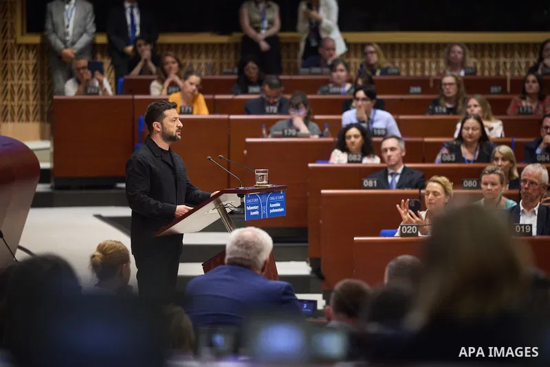 Ukrainian President Volodymyr Zelenskyy, with Council of Europe Secretary General Allen Peers, signs an agreement to establish a special tribunal for the crime of aggression against Ukraine, in The Hague, Netherlands, on...
