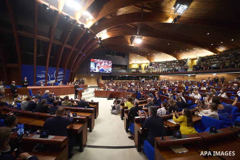 Ukrainian President Volodymyr Zelenskyy, with Council of Europe Secretary General Allen Peers, signs an agreement to establish a special tribunal for the crime of aggression against Ukraine, in The Hague, Netherlands, on...