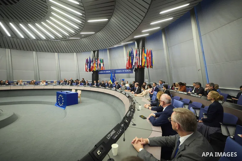 Ukrainian President Volodymyr Zelenskyy, with Council of Europe Secretary General Allen Peers, signs an agreement to establish a special tribunal for the crime of aggression against Ukraine, in The Hague, Netherlands, on...
