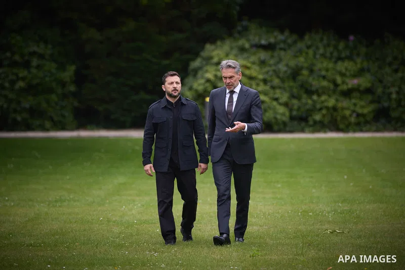 Ukraine's President Volodymyr Zelensky (L) speaks with Netherlands' outgoing Prime Minister Dick Schoof (R) during their bilateral meeting in the gardens of the Catshuis official residence on the sidelines of the two-day...