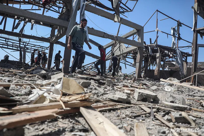 Palestinians inspect Al-Baqa Cafe after it is targeted by an Israeli airstrike in western Gaza City, on June 30, 2025, as the war between Israel and the Hamas Islamist militant movement continues. Photo by Omar Ashtawy\...