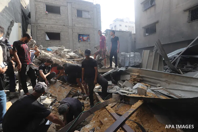 Palestinians inspect the rubble of the Nassar family's home, destroyed by Israeli airstrikes in Al-Shati refugee camp, west of Gaza City, on, July 15, 2025. Photo by Omar Ashtawy\ apaimages