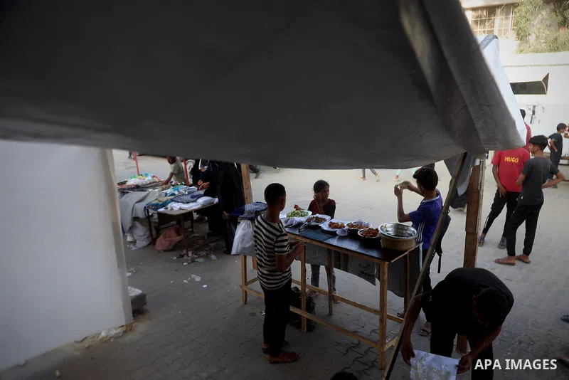 Palestinians, deprived of basic necessities such as shelter, food, and clean water due to ongoing Israeli attacks, buy falafel from street vendors, as it is currently the most affordable and available food option amid se...