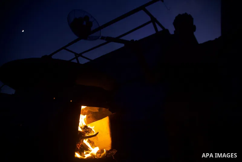 Palestinians, deprived of basic necessities such as shelter, food, and clean water due to ongoing Israeli attacks, buy falafel from street vendors, as it is currently the most affordable and available food option amid se...